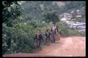 Hmong walking home from market, Thailand, 1986