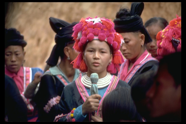 Hmong girl singing kwv txhiaj, Khek Noi, Thailand, 1986